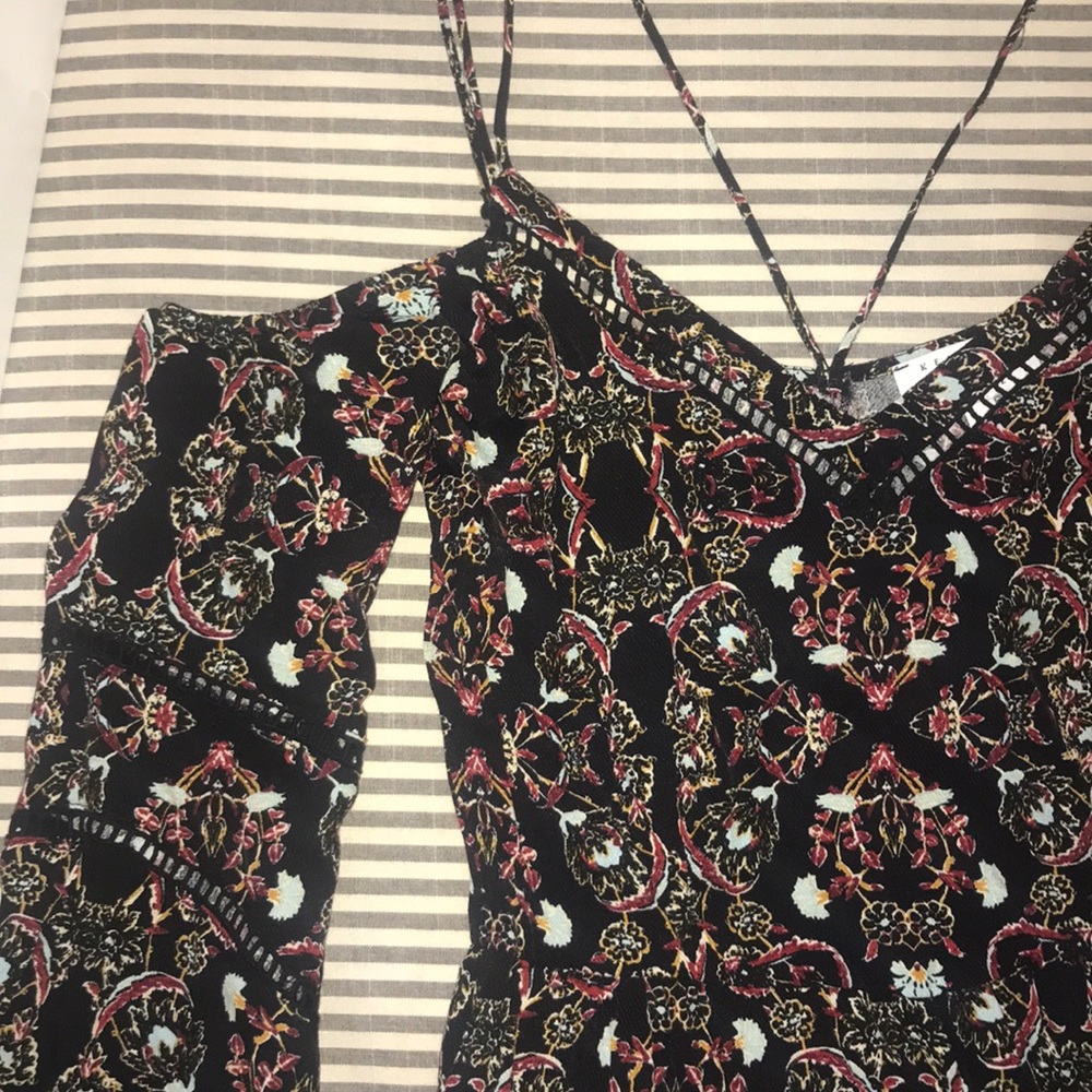 Black and patterned romper